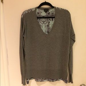 Sweater in the front, flowy blouse in the back